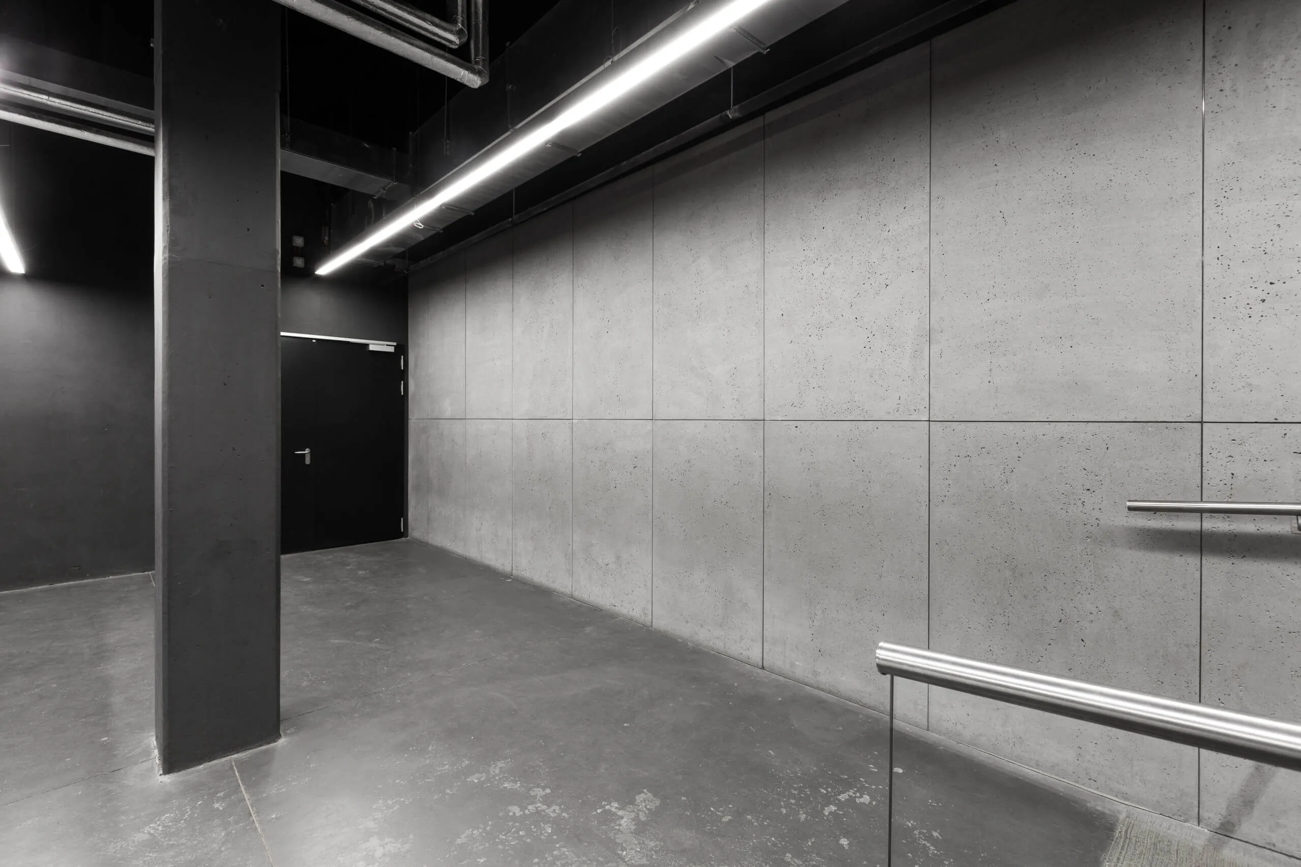 Betonowe płyty na ścianę concreAte ash wymiary niestandardowe — Hydropolis / Wrocław